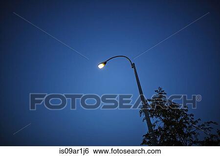 Stock Photograph - Street light at night. Fotosearch