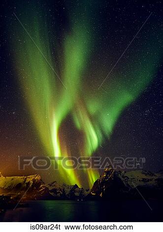 "View of aurora borealis over sea and mountains, Reine, Norway" View Large Photo Image Stock Photograph - "View of aurora borealis over sea and mountains, Reine, Norway". Fotosearch