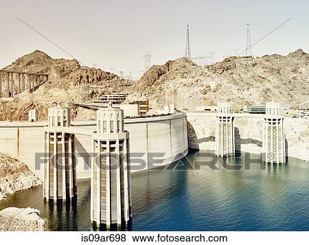 "View of dam wall and water towers at Hoover Dam, Nevada, USA" View Large Photo Image Stock Photo - "View of dam wall and water towers at Hoover Dam, Nevada, USA". Fotosearch