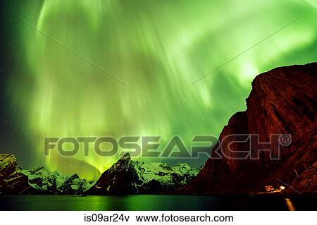 "View of green aurora borealis over sea and mountains, Reine, Norway" View Large Photo Image Stock Photo - "View of green aurora borealis over sea and mountains, Reine, Norway". Fotosearch