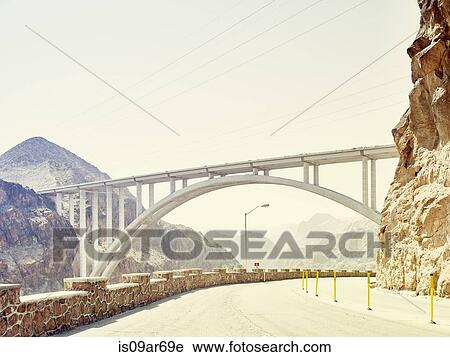 "View of road and bridge at Hoover Dam, Nevada, USA" View Large Photo Image Stock Image - "View of road and bridge at Hoover Dam, Nevada, USA". Fotosearch