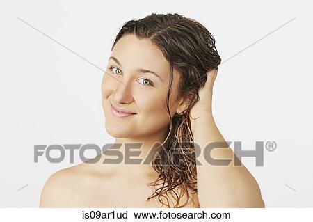 Young woman with wet hair View Large Photo Image Stock Image - Young woman with wet hair. Fotosearch