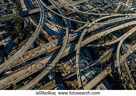 Aerial view of complex curved flyovers and highways, Los Angeles, California, USA View Large Photo Image Stock Photography - Aerial view of complex curved flyovers and highways, Los Angeles, California, USA. Fotosearch