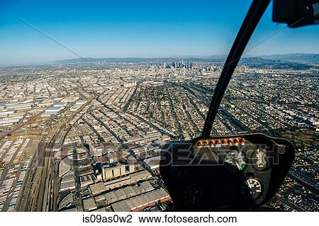 Stock Image - Aerial view of Los Angeles from helicopter cockpit, California, USA. Fotosearch