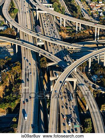 Stock Photo - Aerial view of multi lane highways and curved flyovers, Los Angeles, California, USA. Fotosearch