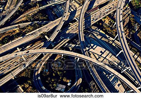 Stock Photography - Aerial view of sunlit curved flyovers and highways, Los Angeles, California, USA. Fotosearch