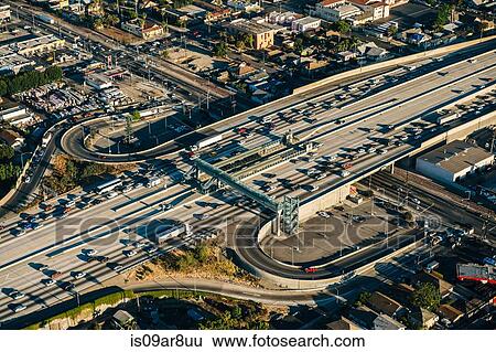 Aerial view of traffic and slip roads on multi lane highway, Los Angeles, California, USA View Large Photo Image Stock Photograph - Aerial view of traffic and slip roads on multi lane highway, Los Angeles, California, USA. Fotosearch
