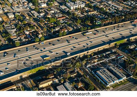 Aerial view of traffic on multi lane highway, Los Angeles, California, USA View Large Photo Image Stock Photograph - Aerial view of traffic on multi lane highway, Los Angeles, California, USA. Fotosearch