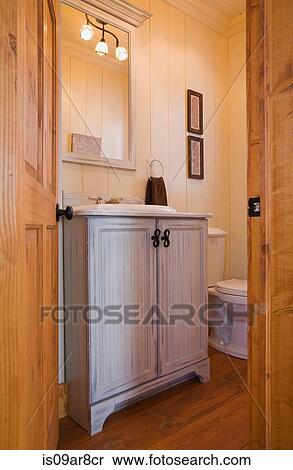 Bathroom with door open inside house View Large Photo Image Stock Photography - Bathroom with door open inside house. Fotosearch