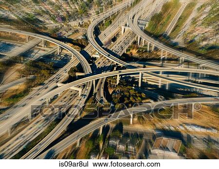 Stock Image - Blurred aerial view of flyovers and highways, Los Angeles, California, USA. Fotosearch