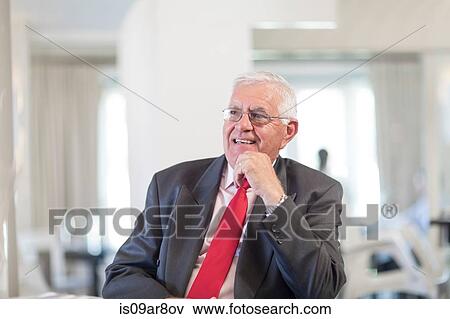 Business man waiting for business lunch appointment View Large Photo Image Stock Photo - Business man waiting for business lunch appointment. Fotosearch