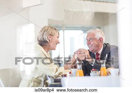Picture - Business people at business lunch. Fotosearch