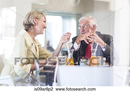 Business people at business lunch View Large Photo Image Stock Image - Business people at business lunch. Fotosearch