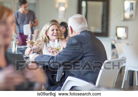 Business people at business lunch View Large Photo Image Stock Image - Business people at business lunch. Fotosearch