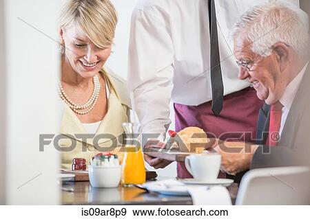 Business people at business lunch View Large Photo Image Stock Photo - Business people at business lunch. Fotosearch