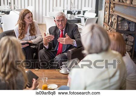 Stock Photo - Business people at business lunch. Fotosearch