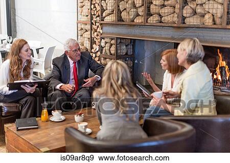 Stock Photo - Business people at business lunch. Fotosearch