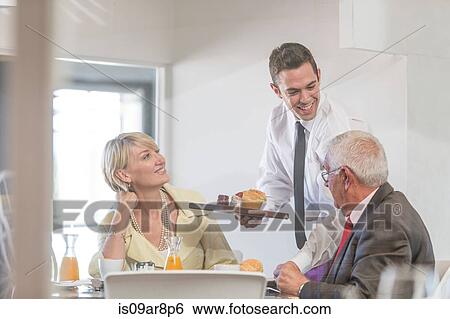 Stock Photograph - Business people at business lunch. Fotosearch