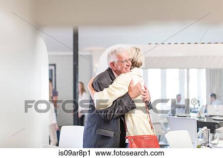 Business people greeting each other at business lunch appointment View Large Photo Image Stock Image - Business people greeting each other at business lunch appointment. Fotosearch