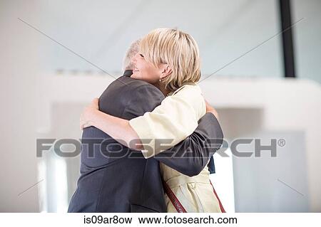 Business people greeting each other at business lunch appointment View Large Photo Image Stock Photo - Business people greeting each other at business lunch appointment. Fotosearch