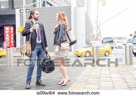 Business people having coffee on the go, New York, USA View Large Photo Image Picture - Business people having coffee on the go, New York, USA. Fotosearch