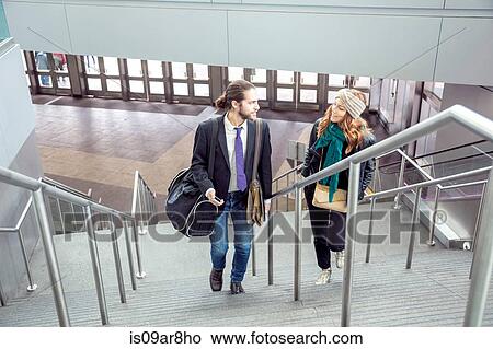 Business people on business trip going up stairs, New York, USA View Large Photo Image Picture - Business people on business trip going up stairs, New York, USA. Fotosearch
