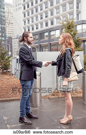 Business people shaking hands, New York, USA View Large Photo Image Stock Photograph - Business people shaking hands, New York, USA. Fotosearch