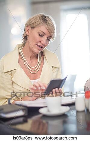 Business woman at business lunch View Large Photo Image Stock Photograph - Business woman at business lunch. Fotosearch