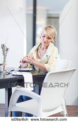 Business woman waiting for business lunch appointment View Large Photo Image Stock Image - Business woman waiting for business lunch appointment. Fotosearch