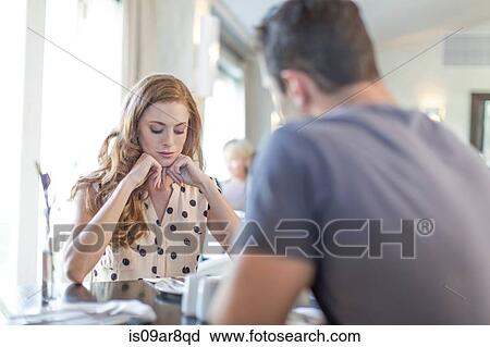 Couple at lunch in restaurant View Large Photo Image Stock Image - Couple at lunch in restaurant. Fotosearch