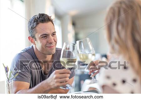 Stock Image - Couple at lunch in restaurant. Fotosearch