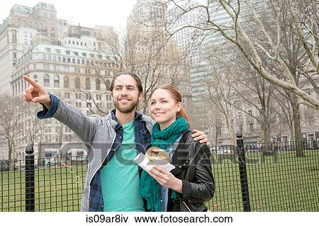 Couple sharing lunch, New York, New York, USA View Large Photo Image Stock Photo - Couple sharing lunch, New York, New York, USA. Fotosearch
