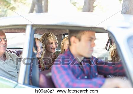 Family in car together, taking road trip View Large Photo Image Stock Photo - Family in car together, taking road trip. Fotosearch