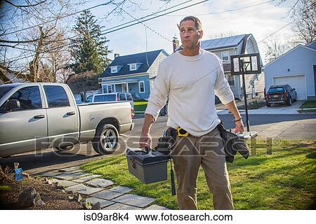 Handyman going to house call View Large Photo Image Picture - Handyman going to house call. Fotosearch