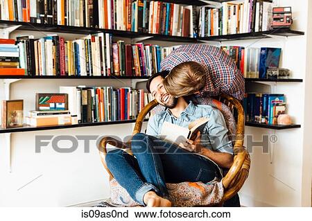 Male couple at home, fooling around, laughing View Large Photo Image Stock Image - Male couple at home, fooling around, laughing. Fotosearch