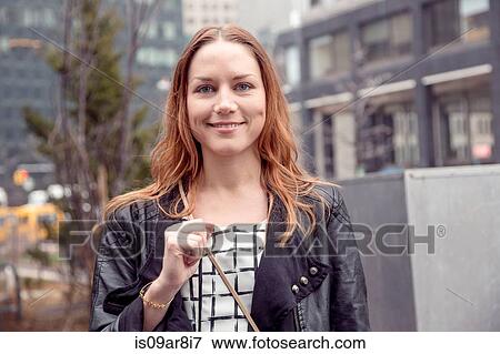 Portrait of a woman in New York, USA View Large Photo Image Stock Photo - Portrait of a woman in New York, USA. Fotosearch