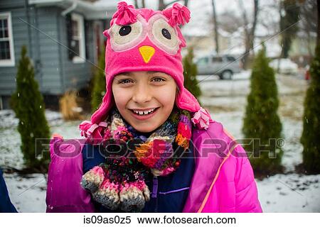 Portrait of girl wearing pink hat with face in snowy garden View Large Photo Image Stock Photography - Portrait of girl wearing pink hat with face in snowy garden. Fotosearch