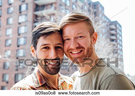 Portrait of male couple, smiling View Large Photo Image Stock Photo - Portrait of male couple, smiling. Fotosearch