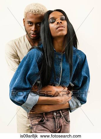 Portrait of young male couple hugging View Large Photo Image Stock Image - Portrait of young male couple hugging. Fotosearch