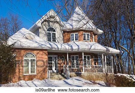 Red brick Victorian cottage style home in winter, Quebec, Canada View Large Photo Image Stock Image - Red brick Victorian cottage style home in winter, Quebec, Canada. Fotosearch