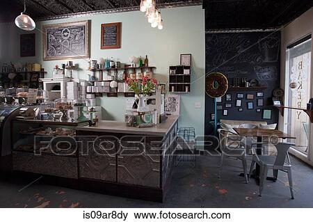 Stock Photo - Service counter of vegan, allergy-friendly bakery and cafe. Fotosearch