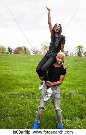 Stock Photography - Two young men posing in park. Fotosearch
