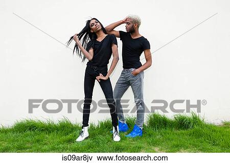 Stock Photo - Two young men posing outdoors. Fotosearch