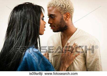 Young male couple, face to face View Large Photo Image Stock Image - Young male couple, face to face. Fotosearch