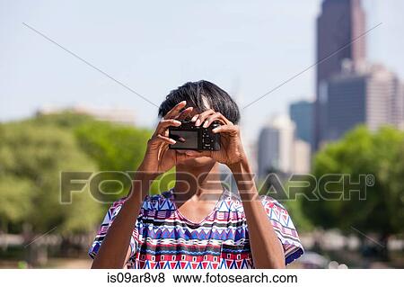 Young man taking selfie in front of city skyline, Philadelphia, Pennsylvania, USA View Large Photo Image Stock Photo - Young man taking selfie in front of city skyline, Philadelphia, Pennsylvania, USA. Fotosearch