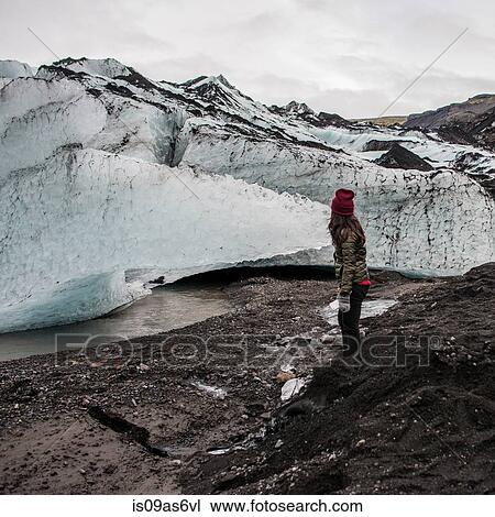 Female tourist exploring glacier at Solheimajokull, Iceland View Large Photo Image Stock Image - Female tourist exploring glacier at Solheimajokull, Iceland. Fotosearch