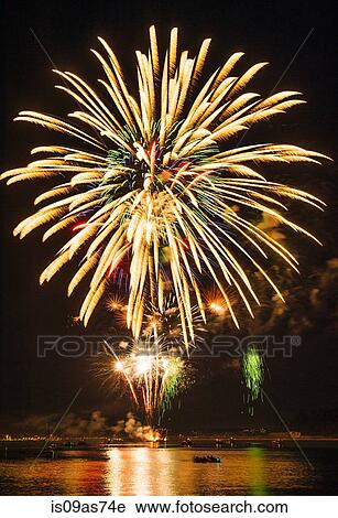 Fireworks exploding over water, Bainbridge Island, Washington, USA View Large Photo Image Stock Image - Fireworks exploding over water, Bainbridge Island, Washington, USA. Fotosearch