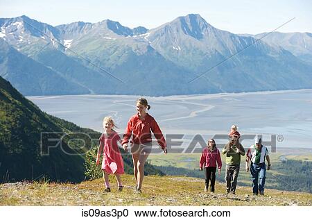 Stock Image - Group of people hiking, Mighty Might Trail, Alyeska Resort, Turnagain Arm, Mt. Alyeska, Girdwood, Alaska, USA. Fotosearch