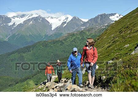 Picture - Group of people hiking, North Face Trail, Alyeska Prince Hotel, Alyeska Resort, seven glaciers, Winner Creek Valley, Turnagain Arm, Mt. Alyeska, Girdwood, Alaska, USA. Fotosearch