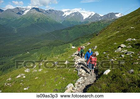 Group of people hiking, North Face Trail, Alyeska Prince Hotel, Alyeska Resort, seven glaciers, Winner Creek Valley, Turnagain Arm, Mt. Alyeska, Girdwood, Alaska, USA View Large Photo Image Stock Image - Group of people hiking, North Face Trail, Alyeska Prince Hotel, Alyeska Resort, seven glaciers, Winner Creek Valley, Turnagain Arm, Mt. Alyeska, Girdwood, Alaska, USA. Fotosearch
